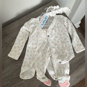 Brand new Carters newborn 3-piece set of onesie, bow and pant